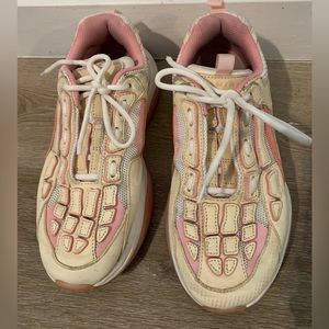 AMIRI Bone Runner Sneakers.